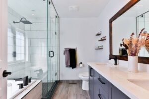 Bathroom in white theme layout with glass shower room